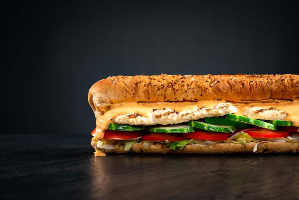 Food Photographer Singapore Subway chicken sandwich with cheese oozing out