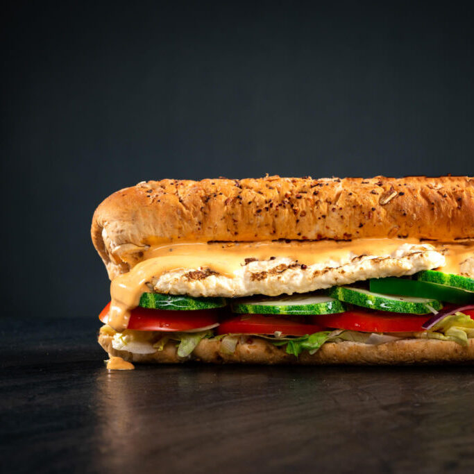 Food Photographer Singapore Subway chicken sandwich with cheese oozing out